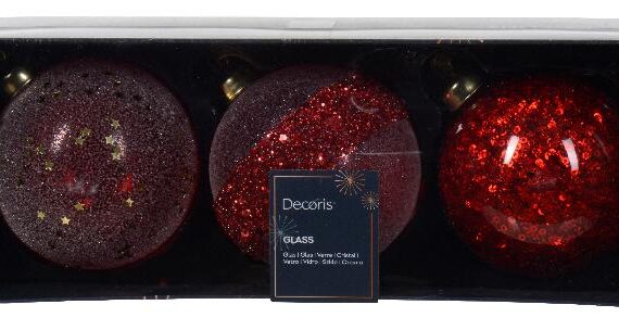 3 κόκκινες διάφανες μπάλες με διακόσμηση γκλίττερ, αστεράκια, χάντρες και πούλιες στο εσωτερικό.