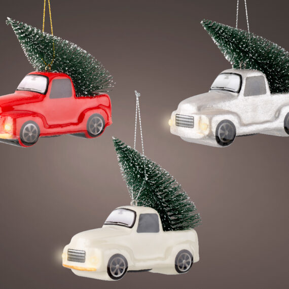 Σετ 3 τμχ αγροτικό αυτοκίνητο που στην καρότσα του έχει χριστουγεννιάτικο δέντρο.Το αγροτικό έχει φώτα μπαταρίας και ανάβει τους προβολείς του. Ένα κόκκινο αγροτικό Ένα ασημί αγροτικό Ένα σπαστό λευκό αγροτικό 11,5 x 5,5 x 5,5cm.