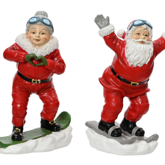 Σετ 2 τμχ Άγιος Βασίλης και Αγιό Βασιλίνα που κάνουν σκι. η Αγιό Βασιλίνα σχηματίζει καρδία με τα χέρια της και ο Άγιος Βασίλης έχει τα χέρια ψηλά. 113,5 x 8 x 20cm