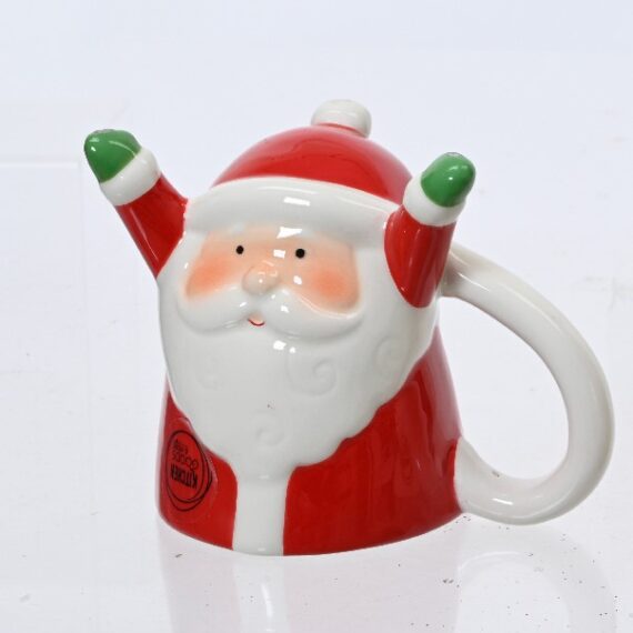 Χριστουγεννιάτικη κούπα Άγιος Βασίλης με τα χέρια σηκωμένα ψηλά σε κόκκινες αποχρώσεις. Η κούπα είναι ανάποδη όταν την χρησιμοποιεις δηλαδή το σχέδιο είναι ανάποδα.  Είναι διαθέσιμη και με χιονάνθρωπο 15,5 x 10 x 12cm